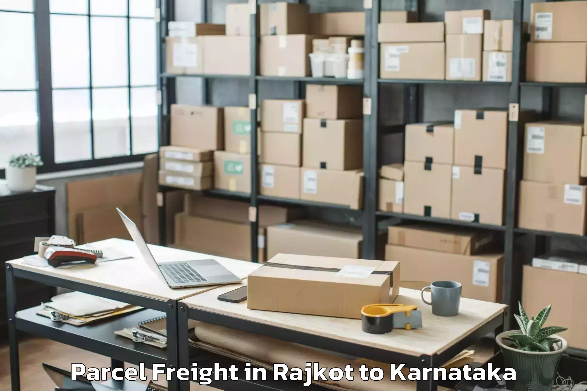 Easy Rajkot to Guledagudda Parcel Freight Booking